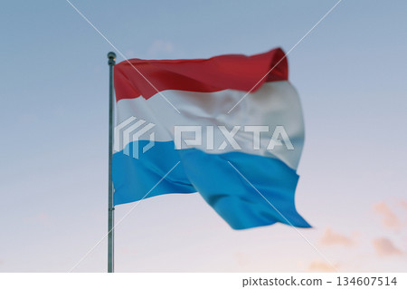 National flag of Luxembourg waving in the wind against a clear sky, symbolizing patriotism, independence, national pride, and unity. National flag of Luxembourg waving in the wind against a clear sky, symbolizing patriotism, independence, national pride, and unity. 134607514