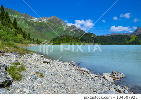 Reservoir lake with mountains epic landscape. Idyllic reservoir Kops lake at 1800 m 134607925