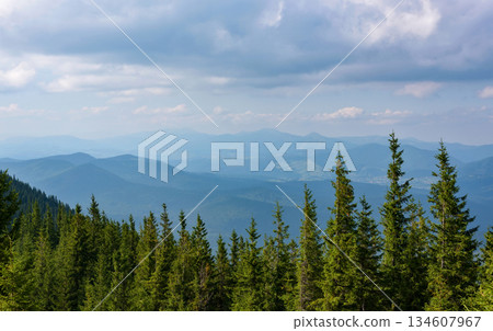 Summer landscape in mountains and blue sky with clouds. Carpathian, Ukraine, Europe. Summer landscape in mountains and blue sky with clouds. Carpathian, Ukraine, Europe. 134607967