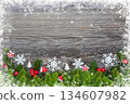 Christmas decorations and spruce branches on a wooden table. Festive  background. Top view 134607982