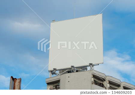 Large blank billboard on a street wall, banners with room to add your own text Large blank billboard on a street wall, banners with room to add your own text 134609203
