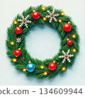 The image shows a Christmas wreath made of fir and pine 134609944