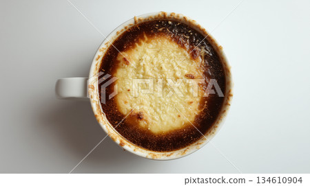 French Onion Soup with Melted Cheese in White Bowl 134610904