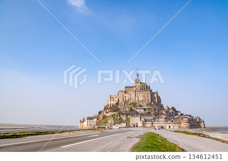 Mont Saint-Michel towering in clear skies 134612451