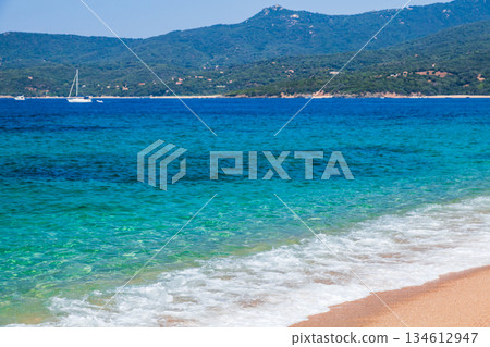 Sandy beach scene on sunny summer day. Propriano, Corsica, France 134612947