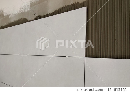 Wall ceramic tiles installation on mortar glue. Wall ceramic tiles installation on mortar glue. 134613131