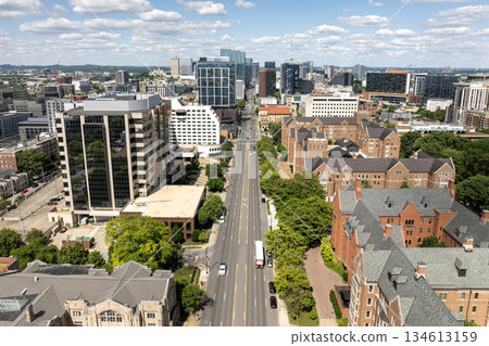Urban cityscape of Nashville downtown district in Tennessee, USA. Skyline with skyscraper buildings in modern American city. 134613159