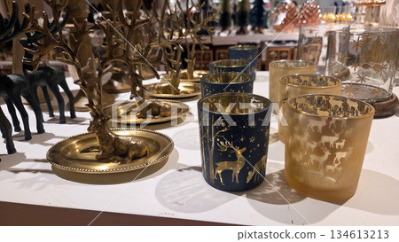 Elegant christmas and new year candle holders with festive reindeer and tree designs Elegant christmas and new year candle holders with festive reindeer and tree designs 134613213