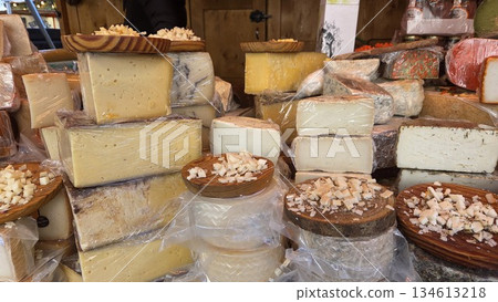 Artisan cheese selection display with variety of textures and flavors. Christmas market Artisan cheese selection display with variety of textures and flavors. Christmas market 134613218