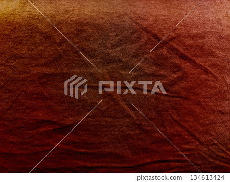 warm rusty red fabric texture gradient with subtle folds and wrinkles evokes earthy autumn mood abstract background ideal for wallpaper or design banner with copy space warm rusty red fabric texture gradient with subtle folds and wrinkles evokes earthy autumn mood abstract background ideal for wallpaper or design banner with copy space 134613424
