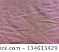 soft pink gradient ribbed fabric texture closeup with blank left copy space ideal for custom banners or serene wallpapers 134613429