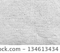 closeup white woven fabric texture intricate weave pattern abstract neutral background for digital wallpaper or banner with copy space 134613434