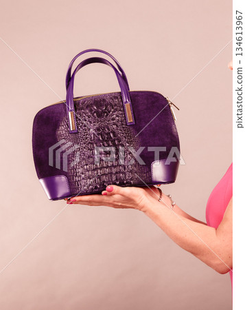 Elegant woman buyer with black bag. Elegant woman buyer with black bag. 134613967