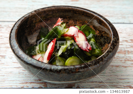 Vinegared octopus, wakame seaweed and cucumber Vinegared octopus, wakame seaweed and cucumber 134613987