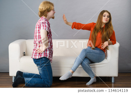 Man begging for forgiveness his woman 134614119