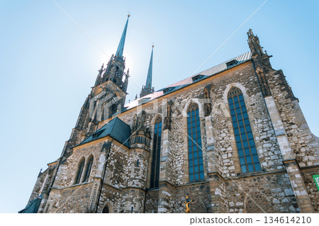 Historic Cathedral of St. Peter and Paul in Brno, Czech Republic under clear blue sky. Beautiful gothic architecture, landmark travel destination and cultural heritage site in Central Europe. Historic Cathedral of St. Peter and Paul in Brno, Czech Republic under clear blue sky. Beautiful gothic architecture, landmark travel destination and cultural heritage site in Central Europe. 134614210