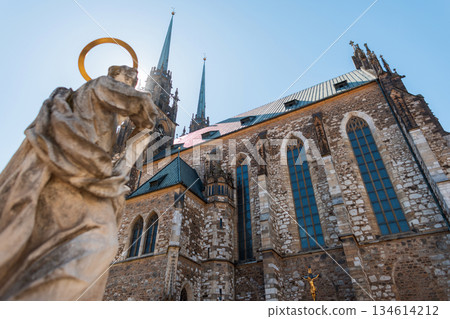 Stunning view of the Cathedral of St. Peter and Paul in Brno, Czech Republic. Iconic gothic landmark bathed in sunlight, symbol of faith and European cultural heritage. Stunning view of the Cathedral of St. Peter and Paul in Brno, Czech Republic. Iconic gothic landmark bathed in sunlight, symbol of faith and European cultural heritage. 134614212