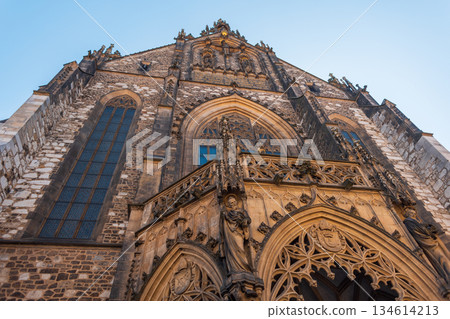 Cathedral of St. Peter and Paul in Brno, Czech Republic, captured from below against a blue sky. Historic religious monument and symbol of the city. 134614213