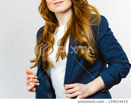Business woman in suit Business woman in suit 134614433