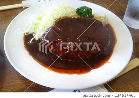 "Hamburg steak" decorated with a rich demi-glace sauce 134614465