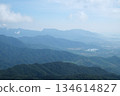 Vietnam Danang Misty mountains and lush forest view from Ba Na Hills near Da Nang Vietnam panoramic scenic landscape with clouds fog and tropical greenery. 134614827