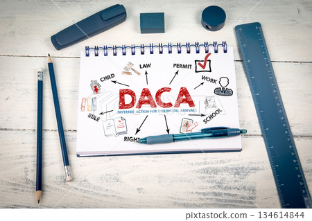 DACA Deferred Action for Childhood Arrivals on Notepad DACA Deferred Action for Childhood Arrivals on Notepad 134614844
