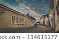 Porvoo, Finland - December 08, 2020: Charming street scene adorned with festive lights, showcasing historic buildings and a beautiful sky, creating a warm evening atmosphere 134615177