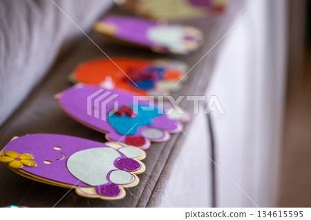 Colorful crafts on a table display during an art activity at a community center in the afternoon 134615595
