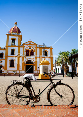 Bicycle and the Historical Church of the Immaculate Conception built in 1843 in the beautiful Heritage Town of Mompox in Colombia 134615723