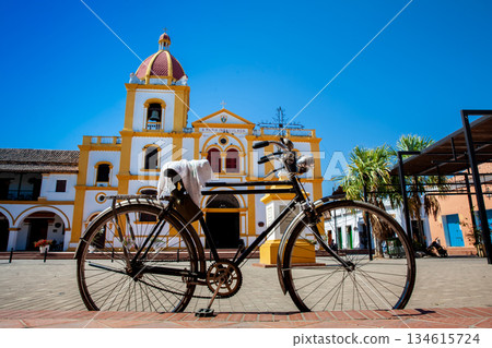 Bicycle and the Historical Church of the Immaculate Conception built in 1843 in the beautiful Heritage Town of Mompox in Colombia Bicycle and the Historical Church of the Immaculate Conception built in 1843 in the beautiful Heritage Town of Mompox in Colombia 134615724