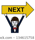 A smiling female student holding a right-pointing arrow with the word NEXT written on it 134615758