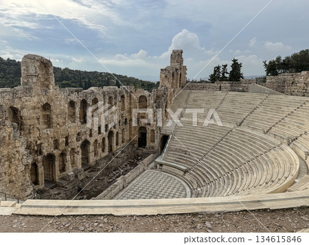Ancient Odeon of Herodes Atticus Amphitheater Ruins With Tiered Stone Seats And Arched Walls, Athens Greece Ancient Odeon of Herodes Atticus Amphitheater Ruins With Tiered Stone Seats And Arched Walls, Athens Greece 134615846