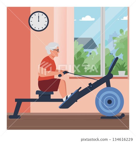 Senior woman exercising on rowing machine in home gym interior with large window Senior woman exercising on rowing machine in home gym interior with large window 134616229