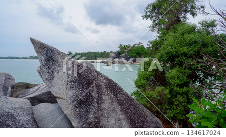 Sharp Granite Rock Formation on Tropical Rocky Coastline Sharp Granite Rock Formation on Tropical Rocky Coastline 134617024