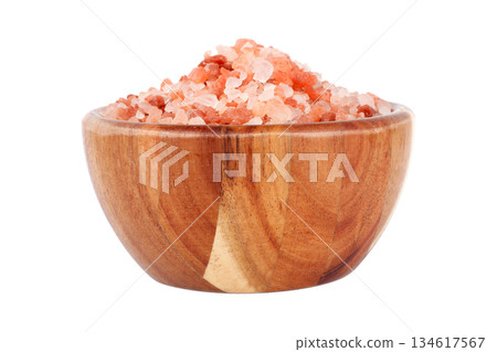Front view of a wooden bowl with Himalayan salt crystals isolated on a white background Front view of a wooden bowl with Himalayan salt crystals isolated on a white background 134617567