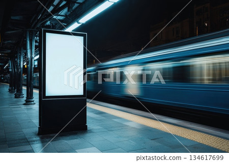 Sleek Empty Advertising Lightbox in Underground Train Station at Night with Motion Blur Sleek Empty Advertising Lightbox in Underground Train Station at Night with Motion Blur 134617699