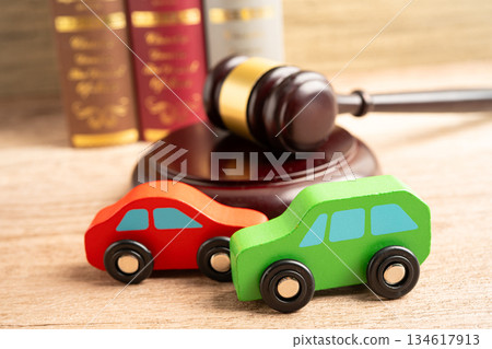 Hammer gavel judge with car vehicle accident, insurance coverage claim lawsuit court case. Hammer gavel judge with car vehicle accident, insurance coverage claim lawsuit court case. 134617913