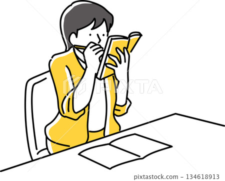 一位女士拿著記事本,正忙著做筆記。 一位女士拿著記事本,正忙著做筆記。 134618913