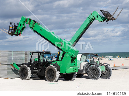 Telescopic Boom Lift. Boom lift outdoor. Machine equipment. Heavy crane equipment. Boom lifting machinery. Lift machine crane for building site Telescopic Boom Lift. Boom lift outdoor. Machine equipment. Heavy crane equipment. Boom lifting machinery. Lift machine crane for building site 134619289