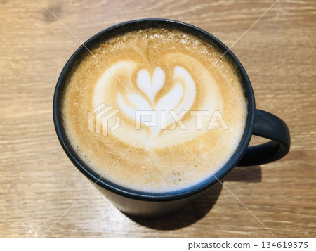 Cafe au Lait in a cute mug with heart cafe art 134619375