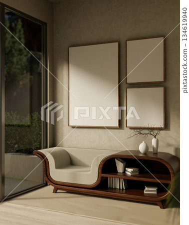 Blank frames on living room wall over a creative table with armchair on wooden floor near glass wall Blank frames on living room wall over a creative table with armchair on wooden floor near glass wall 134619940