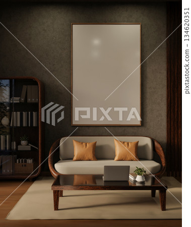 Blank frame on living room wall over an armchair or sofa on carpet with a bookshelf on wooden floor. 134620351