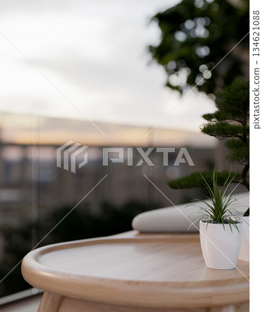 Close up of a wooden spa massage bed on a house's terrace or balcony with glass railing partitions. 134621088
