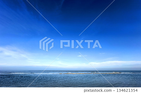 A Stunning Ocean View Beneath an Expansive Clear Blue Sky Awaits Your Discovery Today 134621354