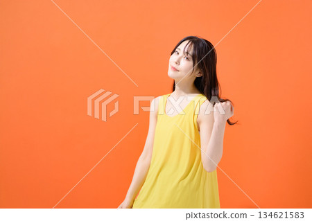 Orange background beauty image Orange background beauty image 134621583