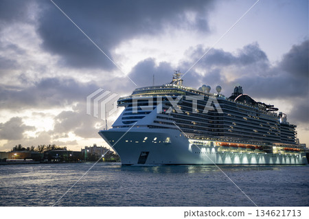 Sea trip. Traveling and voyage, banner. Cruise ship vacation. View on cruise ship in evening vacation summer. Travel at sea. Vacation on cruise ship liner. Luxury liner. Ship leaving port Sea trip. Traveling and voyage, banner. Cruise ship vacation. View on cruise ship in evening vacation summer. Travel at sea. Vacation on cruise ship liner. Luxury liner. Ship leaving port 134621713
