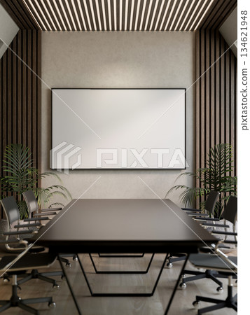 Blank frame hanging horizontally over black table with swivel chairs in a meeting room of the office 134621948