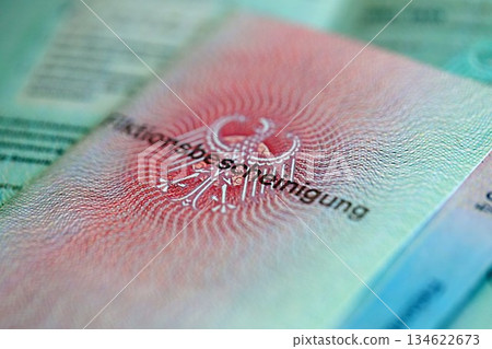 German temporary Permanent resident card specimen lies on wooden table close up. Fiktionsbescheinigung 134622673
