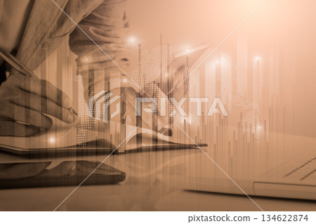 Stock market or forex trading graph and candlestick chart suitable for financial investment concept. Economy trends background for business idea and all art work design. Abstract finance background. Stock market or forex trading graph and candlestick chart suitable for financial investment concept. Economy trends background for business idea and all art work design. Abstract finance background. 134622874