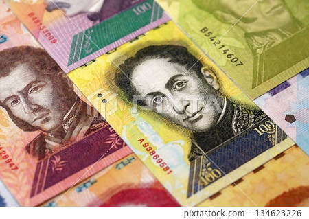 Venezuelan Bolivar currency money bills in big amount. VED currency banknotes with different denomination close up 134623226